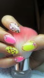 Pink and yellow nails with rhinestones