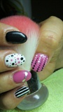 Black, white and pink nails with dots