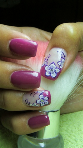 Purple nails with a flower