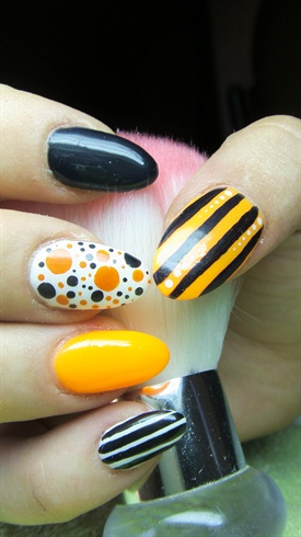 Orange, black and white nails