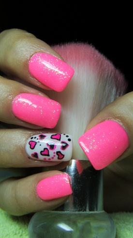 Pink and white nails with hearts