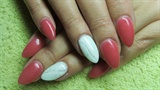 White feather on nails