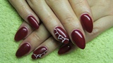 Dark red nails with white lines