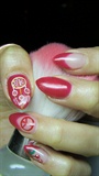 Red nails with dreamcatcher