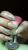 Nails with animal print and rhinestones