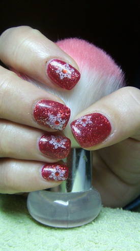 Red nails with snowflakes