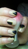 Beige nails with black triangles