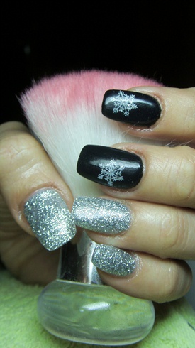 Black and silver nails with snowflakes