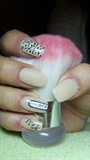 Beige nails with animal print 