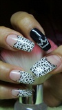 Nails with animal print and a crown