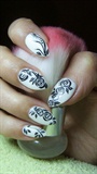 White nails with black roses