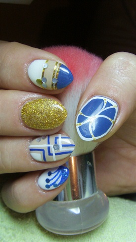 White, blue and gold nails