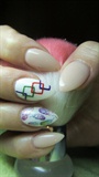 Nails with feathers and cubes