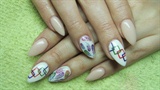 Nails with feathers and cubes