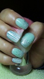 Turquoise (pale green) and white nails 