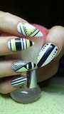 White, black and yellow stiletto nails