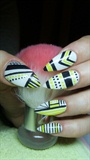 White, black and yellow stiletto nails
