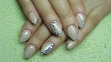 Nude (beige) nails with silver glitter 
