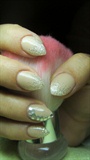Nude (beige) nails with silver glitter 