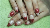 Nude (beige) and red nails with hearts