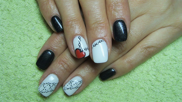 Black and white nails with a heart