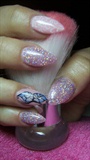 Pink nails with glitter and butterfly