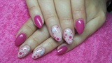 Pink nails with dots and hearts