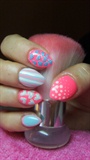 Turquoise and pink nails with hearts