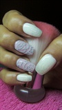 White and lilac nails with a rose