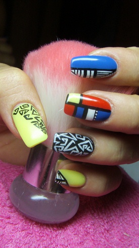 Blue, black, yellow, white and red nails
