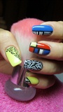 Blue, black, yellow, white and red nails