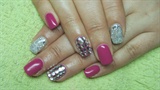 Dark pink nails with rhinestones