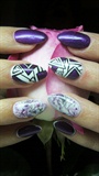 Purple, white and black nails