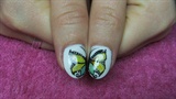 White nails with a butterfly