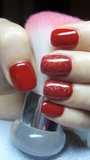 Red nails with glitter