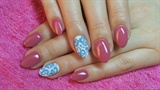 Pink and blue nails with glitter