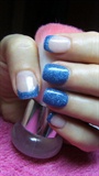French manicure with blue glitter