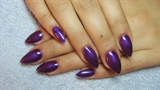 Dark purple stiletto nails