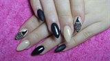 Beige and black stiletto nails