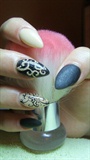 Black, beige and gold stiletto nails