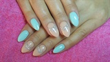 Nude and turquoise nails with glitter