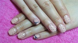 Nude nails with dots and hearts