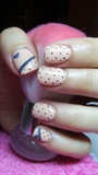 Nude nails with dots and hearts
