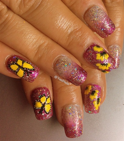 Vibrant yellow on purple nails