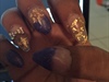 Gold And Purple Stiletto Acrylic Nails