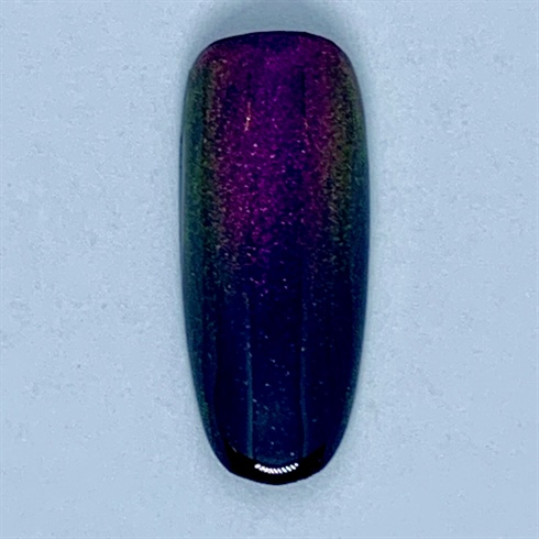 Polish cat eye gel polish over cured black gel polish and place magnet over the tip of the nail to shift effect upward towards the center of nail. Cure for 30 seconds under LED or 1 minute under UV light. Apply non-cleanse top coat.
