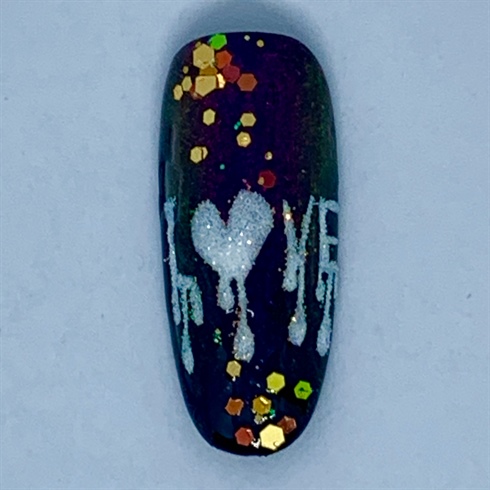 Apply non-cleanse top coat and apply glitter embellishments. Retrace words with pop-up gel then sprinkle sugar glitter over word art. Cure for 30 seconds under LED or 1 minute under UV light then brush off excess glitter.