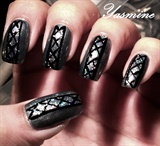Black crossed lines handpainted nail art